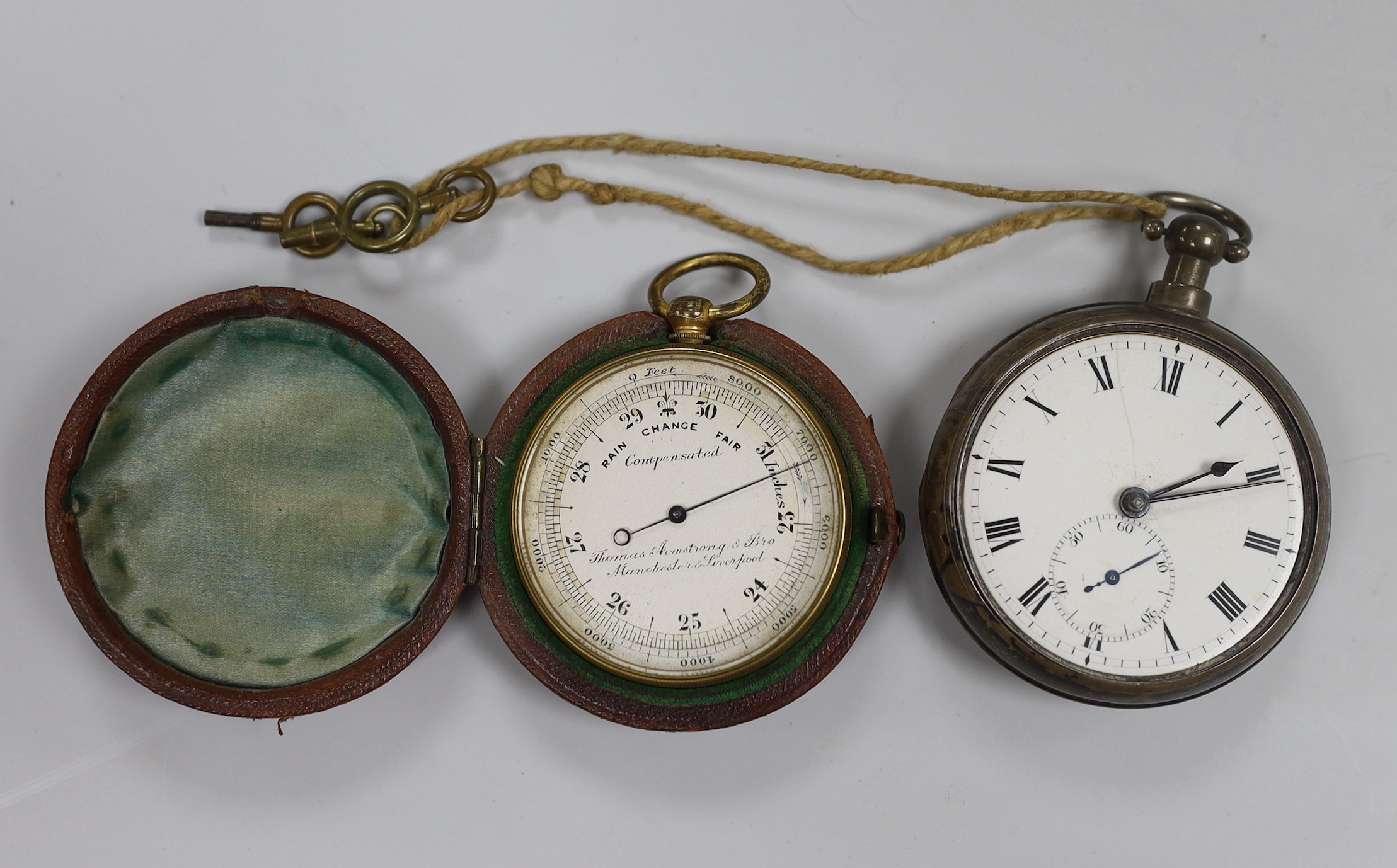 A George III silver pair cased pocket watch with enamel dial and fusee movement, London 1810, William Mean, together with a pocket barograph with leather case, the watch 52mm in diameter